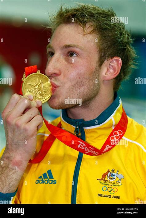 Matthew Mitcham Of Australia Kisses His Gold Medal For The Men S 10m Platform Diving Final At