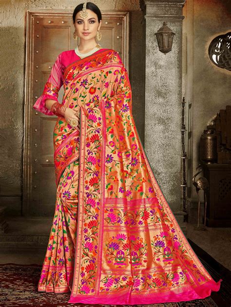 golden silk saree with multi colored lotus motifs and pink highlights in 2020 party wear