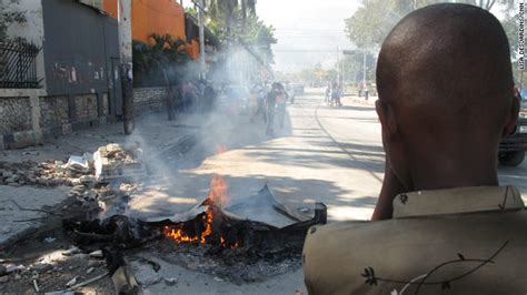 Tired Of Stench Haitians Torch Bodies In Plaza