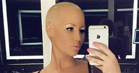 Losing a game of strip darts. Amber Rose strips 100% nude for risqué shoot: 'Break the ...