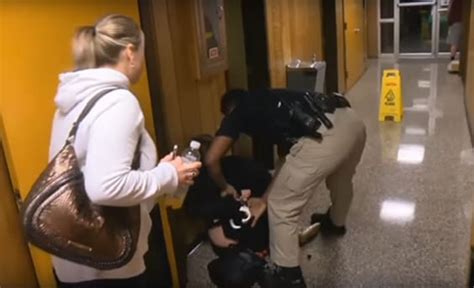 teacher handcuffed arrested after questioning school board about superintendent s contract