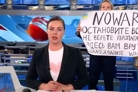 do not believe the propaganda anti war protester interrupts russian television news