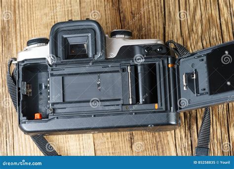 The Back View Of An Old Film Camera Wooden Background Stock Image