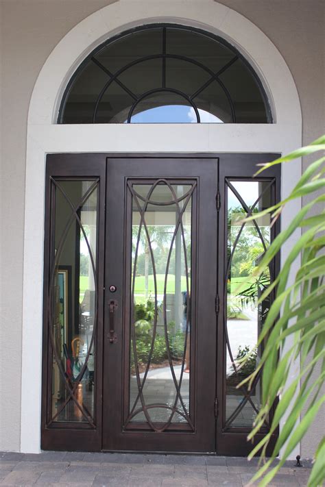 This Single Regio Iron Door With Sidelights Is A Door Fit For A King