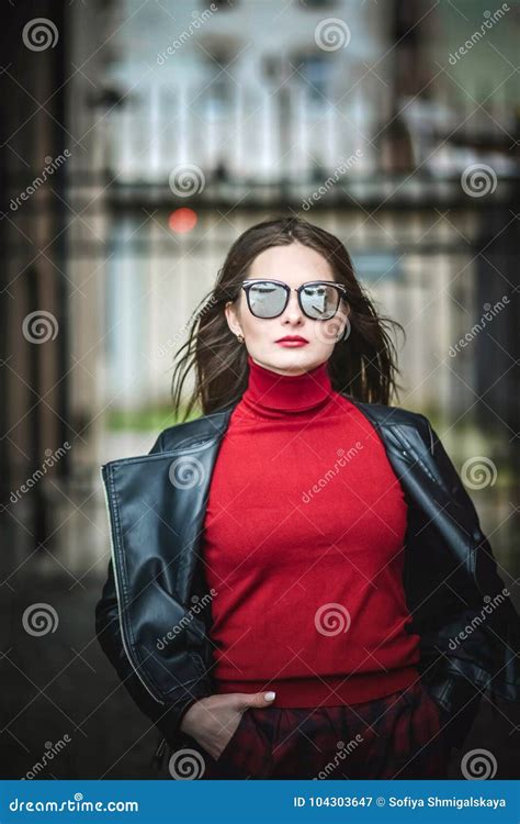 The Coolest Girl In The Black Leather Jacket And Sunglasses Walks