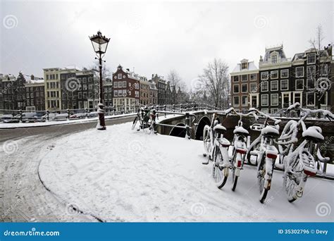 Amsterdam Covered With Snow With The Westerkerk In Netherlands Royalty