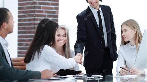 Premium Photo Handshake Manager And Customer In A Modern Office
