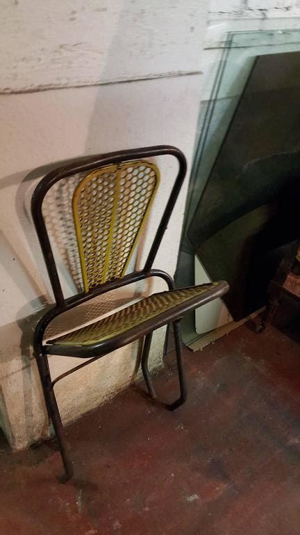 Folding metal bistro chair w/ scrolling heart & peacock tail motif, set of two. Rare Set of 20 Industrial Bistro Metal Folding Chairs ...