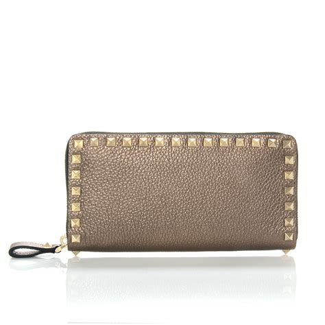 Shop our wide variety of products at the lowest online prices. Valentino Rockstud Metallic Zip Around Wallet in Metallic ...
