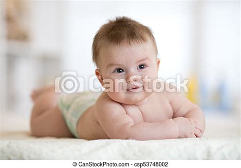 Cute Baby Boy Laying Down On Bed In Nursery Canstock