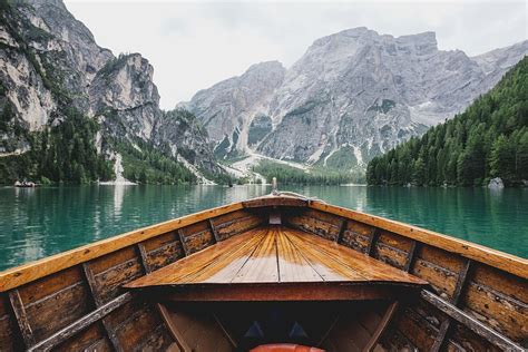 Hd Wallpaper Brown Wooden Boat Moving Towards The Mountain Person