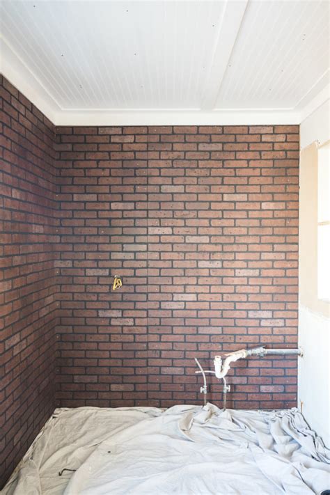 Then i glued the tiles on the wall using tiling adhesive. How to Paint an Industrial Faux Brick Wall - Cherished Bliss