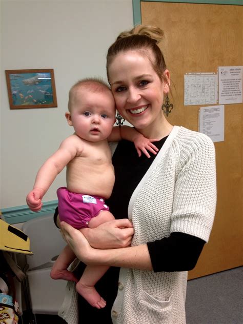 Hold baby's legs up and put a clean nappy beneath baby's bottom. In this JOYFUL life: 6 Month Doctors Appointment
