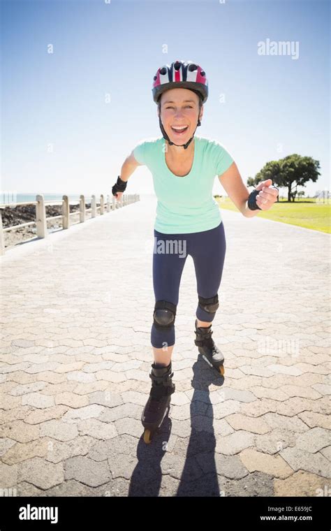 Fit Mature Woman Rollerblading On The Pier Stock Photo Alamy