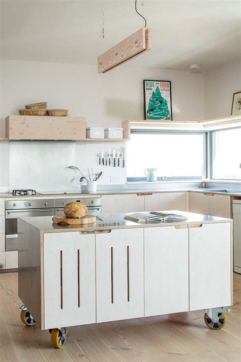 8 Examples Of Kitchens With Movable Islands That Make It Easy To Change