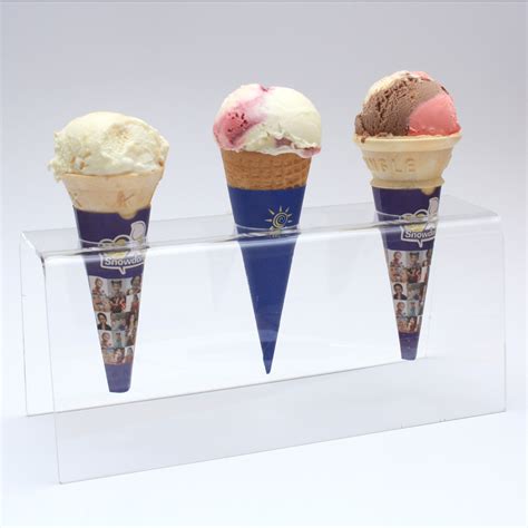 Our freestanding cone guard hold 5 cones, and comes with your choice of holes to fit standard sugar cones or larger waffle cones. Snowdon Ice-Cream Cone Holder Stand - Snowdon Ice Cream Cones