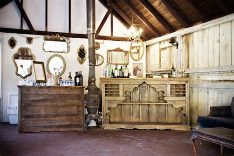 rustic wedding venue mirrored decor | OneWed.com