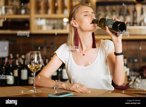 Nice Young Woman Drinking Lots Of Wine Stock Photo Alamy