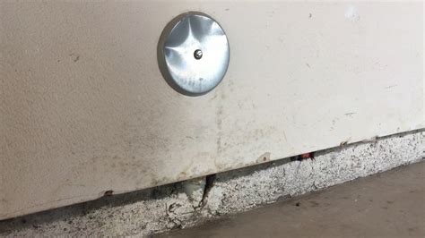 Leaks on the walls can cause mold to build up. Drywall mold growth next to clean out - YouTube