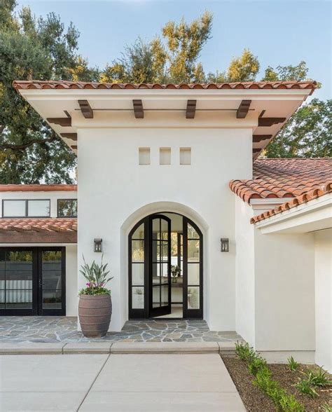 Modern Spanish Style Home With Black Arched Glass Door Marianne Simon