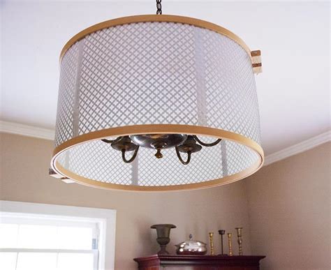 This diy drum chandelier looks similar to expensive ones on the market with hanging crystals and a modern style. Illumination Challenge - Knuckle Salad