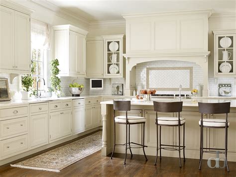 Practical drawers, cabinets and beautiful marble countertops are perfect for your daily kitchen tasks. Ivory Shaker Kitchen Cabinets - Transitional - Kitchen