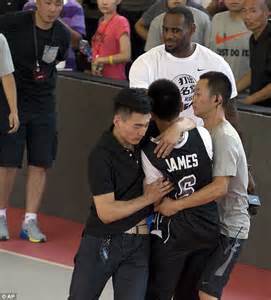 LeBron James mobbed by basketball fans on triumphant return to China