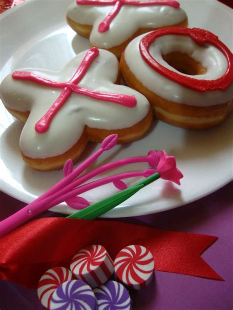 If you had a sneaking suspicion that krispy kreme was going to be slinging some free donuts, you've got a good sense of how food holidays work. Krispy Kreme VDay Double Heart Treats