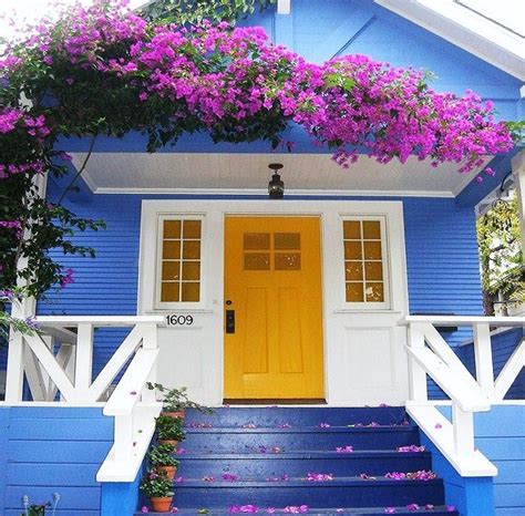 Soft yellow blue house yellow door. yellow_door_house_white_trim_blue_pink_floral (With images ...