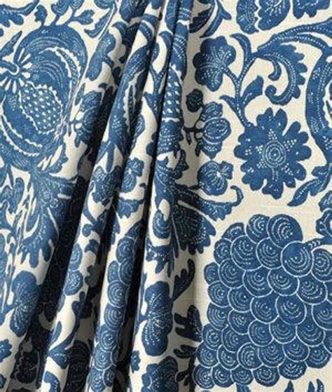 Neutral living room with bold pops of cobalt blue and orange. Indigo blue and off white lined curtains Cobalt blue lined ...