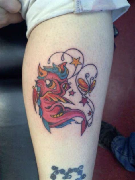 dragon cartoon tattoos for women | Baby dragon with butterfly tattoo