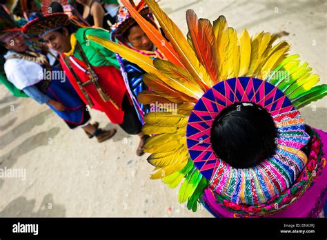 natives of the kamentsá and inga tribes wearing colorful headgears take part in the carnival