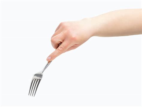 Holding Fork Stock Photos Pictures And Royalty Free Images Istock