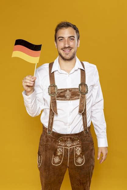 Free Medium Shot Of Man Holding German Flag Free Photo Nohatcc