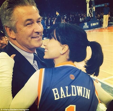 Alec Baldwins Wife Hilaria Dons Personalised Jersey As She Cuddles Up