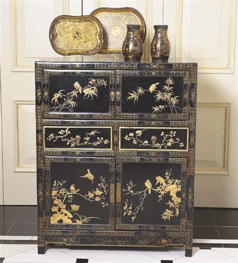 A Chinoiserie Black Lacquered Cabinet Christies