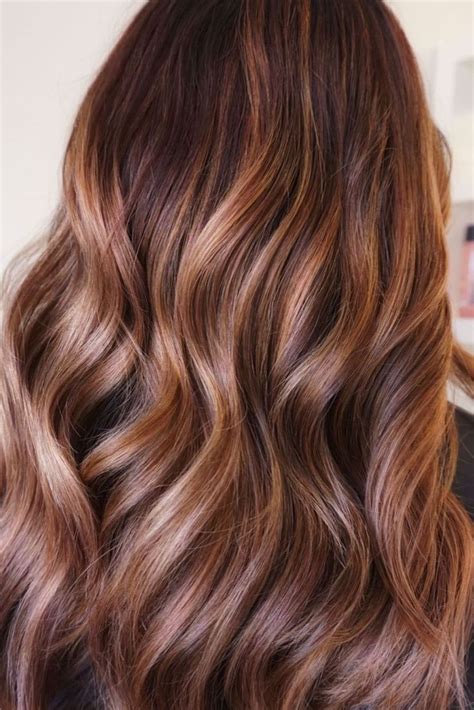 the copper hair trend is a must for fall 2021 lishé salon has created this beautiful cinnamon