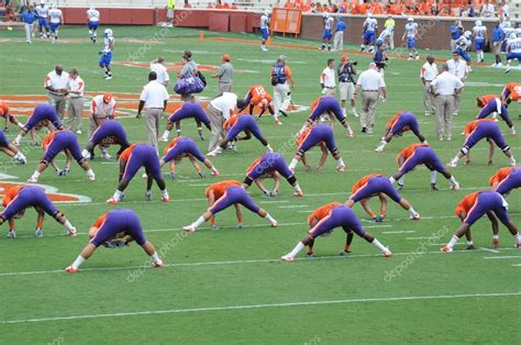 Clemson Football Players Stretching Stock Editorial Photo © Shooterjt