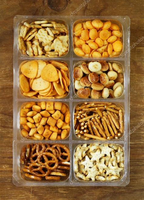 Various Salty Snacks Crackers Chips Nuts Pretzels — Stock Photo