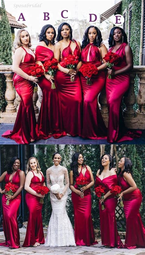 bridesmaids in red dresses and bouquets posing for pictures at the same time