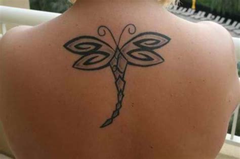 This small design fits nicely on the wrist and has enough detail to really create a unique dragonfly tattoo. Tribal dragonfly tattoo