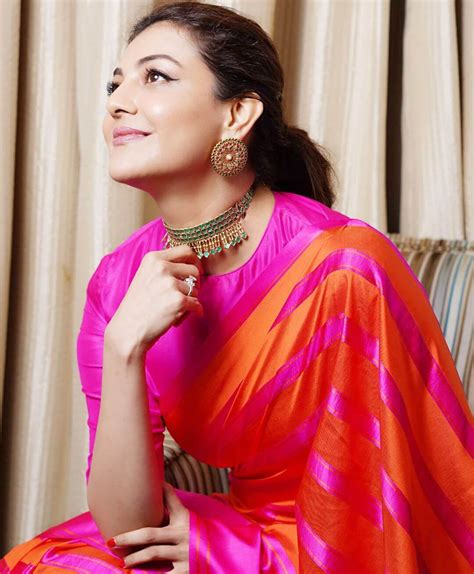 Beautiful Photos Of Kajal Agarwal In Her Pink And Orange Silk Saree