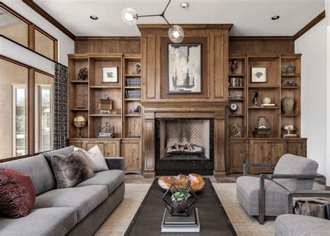 Should you install floor to ceiling cabinets or leave space? Grand Floor-to-Ceiling Fireplace With Built-In Bookshelves ...