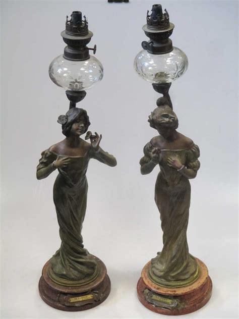 A Pair Of French Art Nouveau Patinated Spelter Figural Lamps In