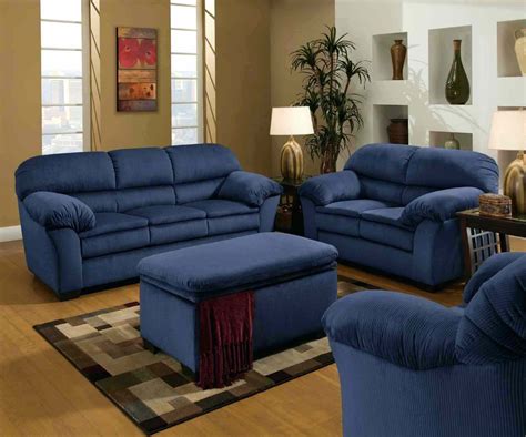 Complete with soft, velvety upholstery, the set is generously studded with button tufting across its seat, arms, and back for a chesterfield look. 20 Best Blue Sofa Living Room Design - AllstateLogHomes.com