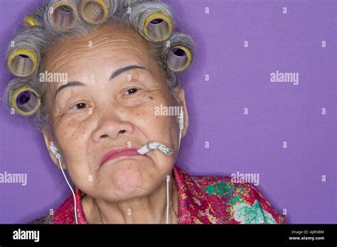 Portrait Of Senior Woman Smoking Stock Photo Alamy