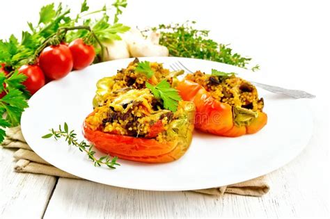 This recipe for stuffed peppers actually originally appeared on page 407 of our clean cuisine book using button mushrooms. Pepper Stuffed With Mushrooms And Couscous In Plate On ...