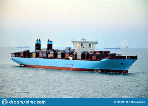 Red Cargo Container Ship At Sea Royalty Free Stock Photo