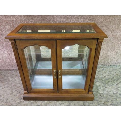 Boyel living franklyn lighted console curio c. 1970s Traditional Lighted Two Door Curio Console Cabinet ...