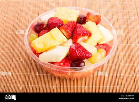 A Plastic Bowl Of Fresh Cut Fruit Stock Photo Alamy